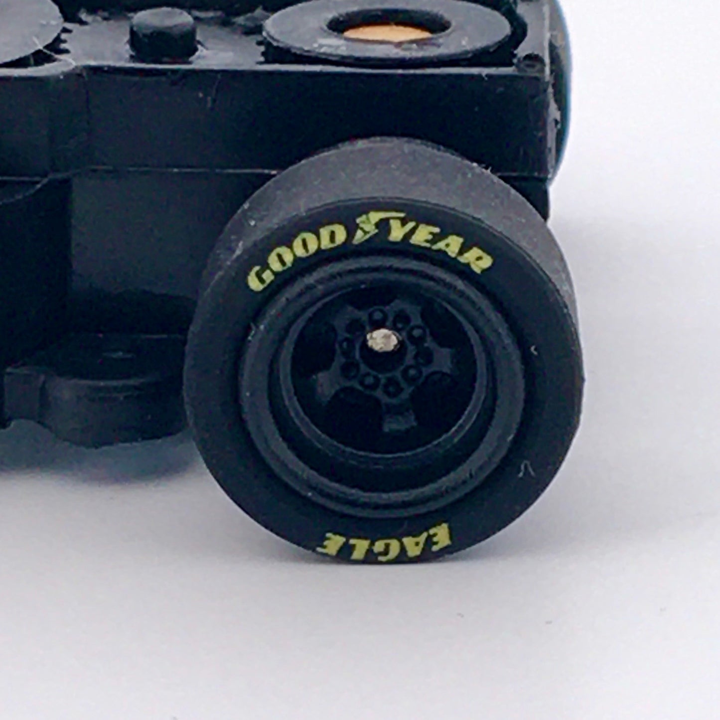 Auto World 4Gear Slot Car Chassis, Black Wheels, GoodYear Eagle Tires