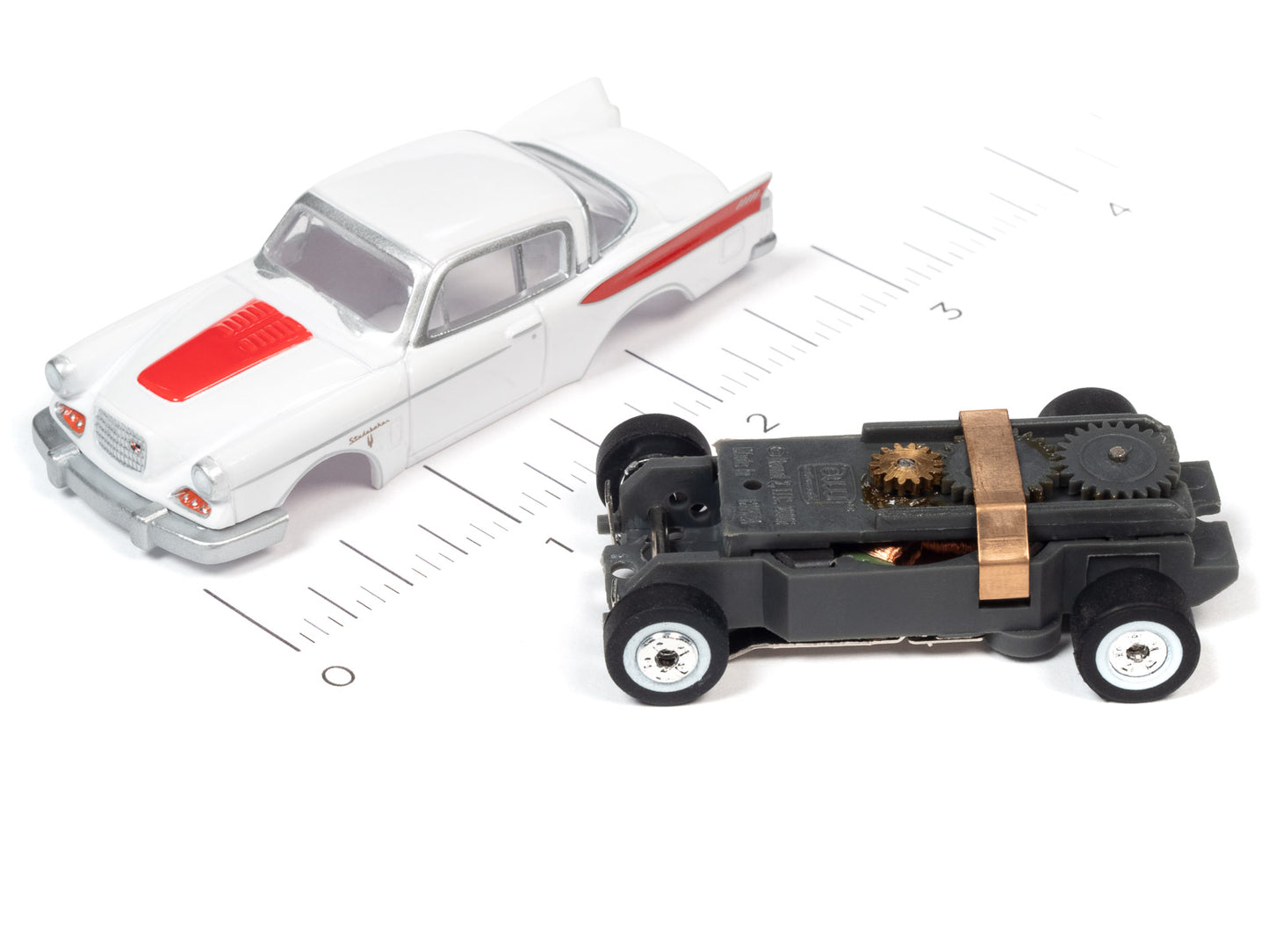 1957 Studebaker (White) H.O. Scale Slot Car, ThunderJet Chassis | Auto World