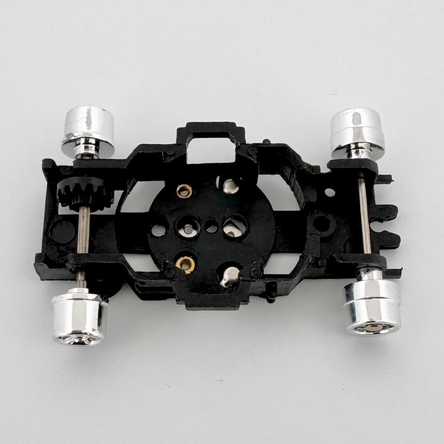 Auto World Bare Chassis Tub (Black) for XTraction Slot Car Chassis Top View