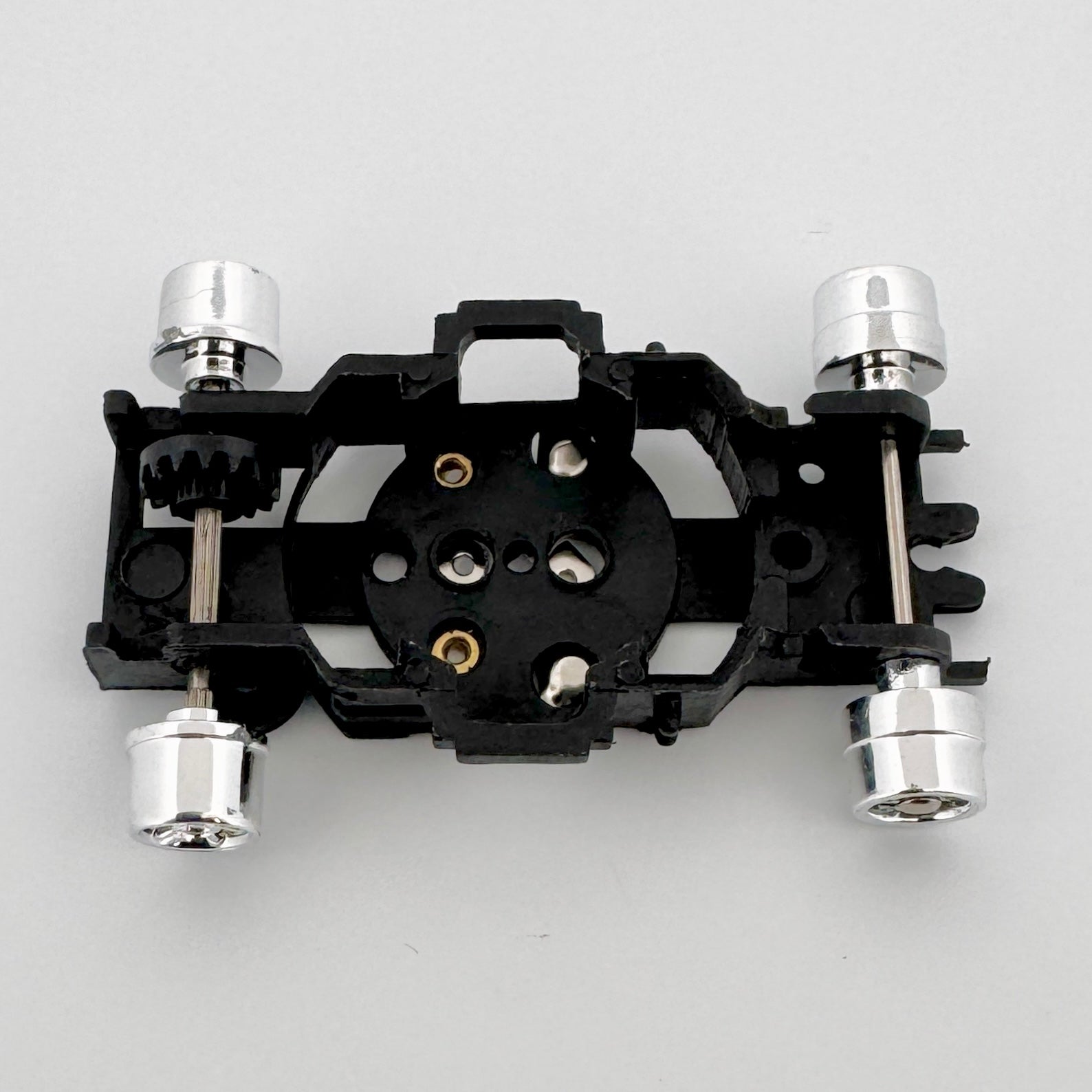 Auto World Bare Chassis Tub (Black) for XTraction Slot Car Chassis Top View