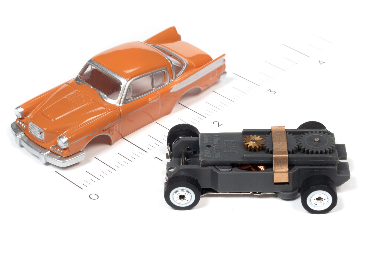 1957 Studebaker (Salmon) H.O. Scale Slot Car, ThunderJet Chassis | Auto World