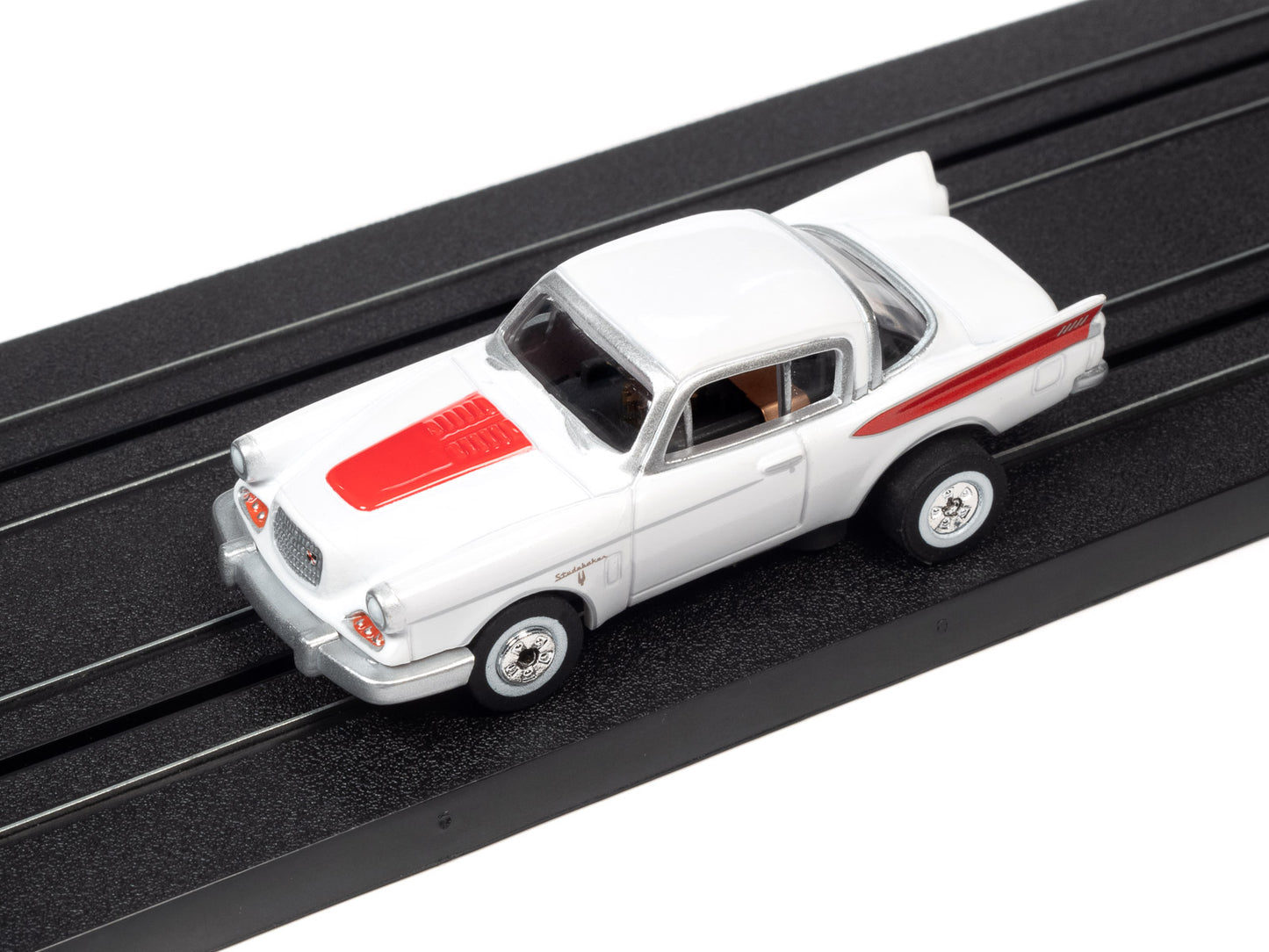1957 Studebaker (White) H.O. Scale Slot Car, ThunderJet Chassis | Auto World